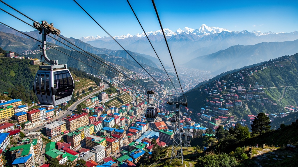 Gangtok Ropeway cable car with aerial view of Gangtok city and Himalayan mountains